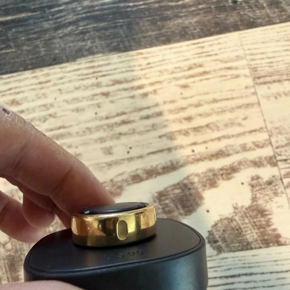 Oura Gold and Black Wearable Ring